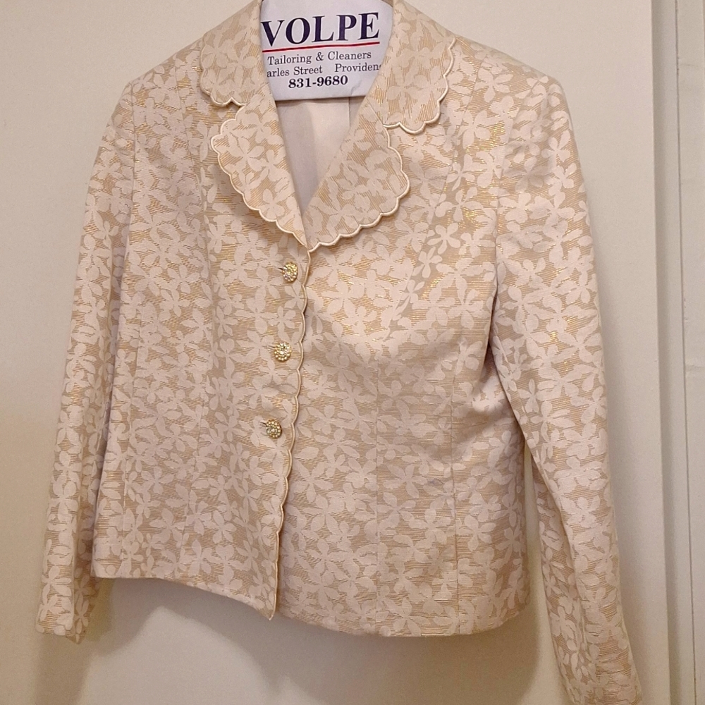 2 piece suit. Cream with Light gold flecks with white flowers